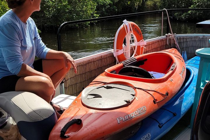 a man and a woman sitting on a boat