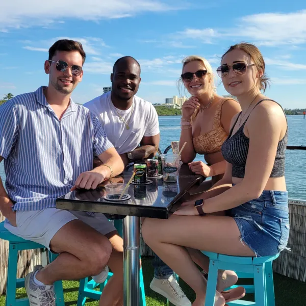 a group of people sitting on a bench