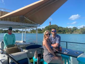 a man standing next to a boat