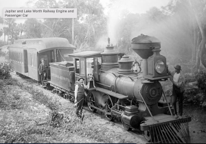 a vintage photo of a steam train on a steel track